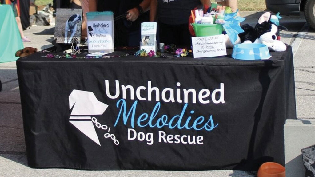 Unchained Melodies Volunteer Booth