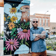 Cody Finley’s artful representation at the corner of Ninth and Broadway pays homage to colorful native plants.