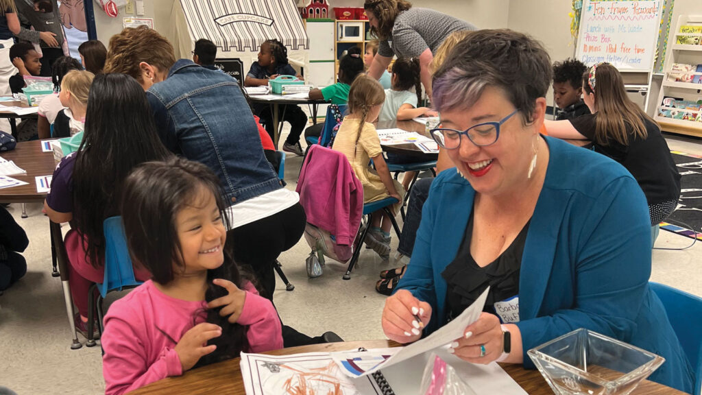 Mayor Buffaloe works with a student as part of Columbia Public Schools’ Partners in Education program.