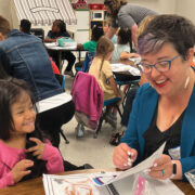 Mayor Buffaloe works with a student as part of Columbia Public Schools’ Partners in Education program.