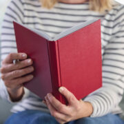 Woman Reading On The Couch