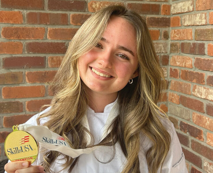 Sydney Bliss with her first place medal in SkillsUSA