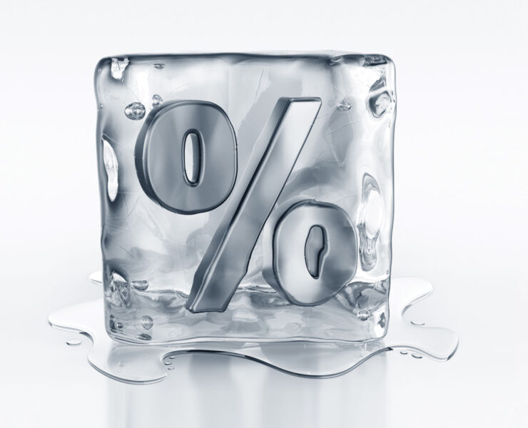 Illustration of ice cube with percentage sign carved into it and ice melting