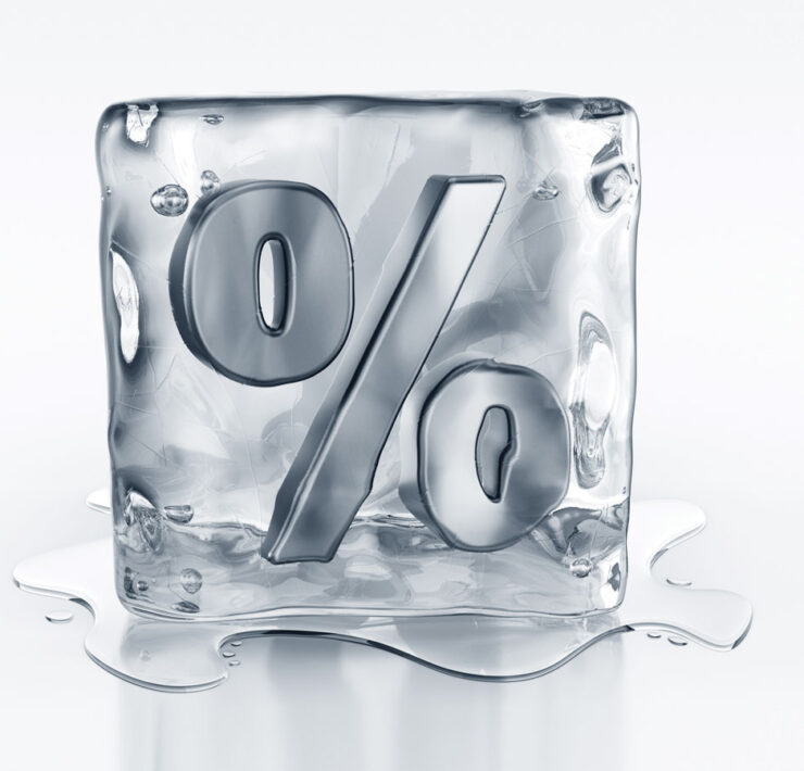 Illustration of ice cube with percentage sign carved into it.