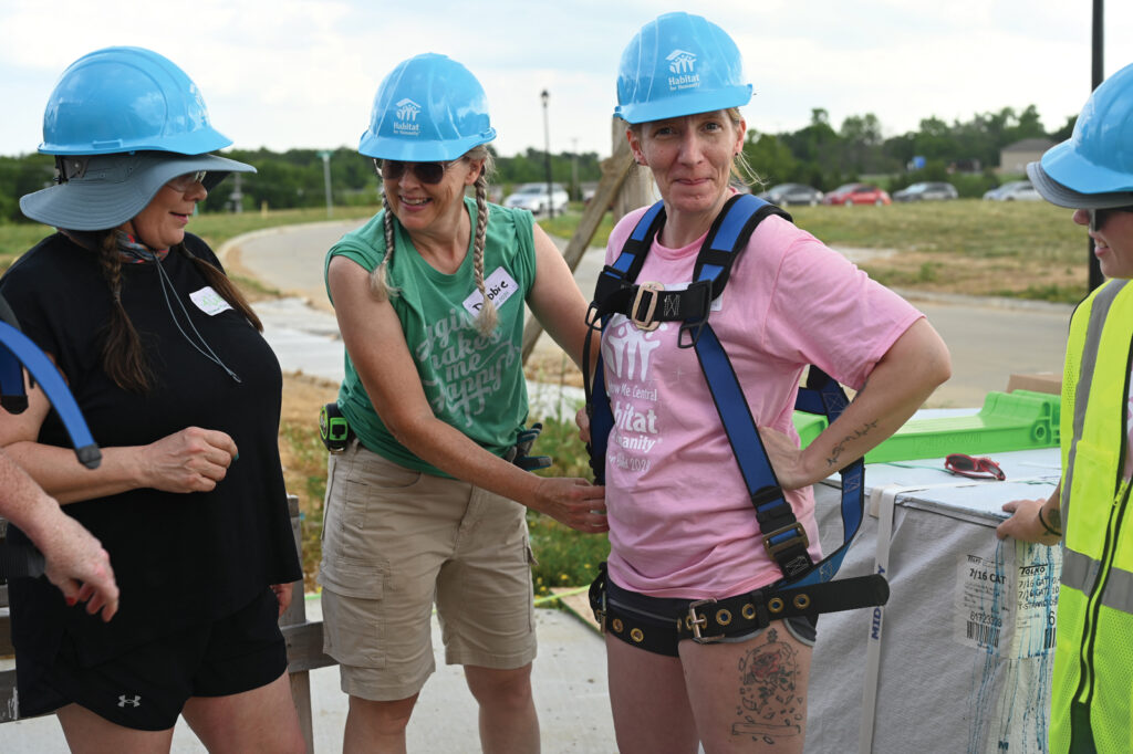 A Volunteer Taking Safety Precautions During The Show Me Central Habitat For Humanity Women Build Event