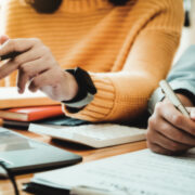 A Man And Woman Discuss A Budget