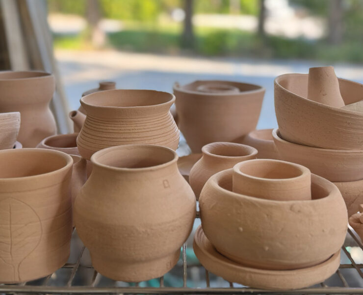 Shelf Of Ceramics Students Creations From Access Arts