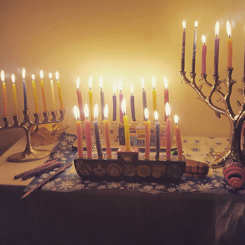 Menorahs lit celebrating Chanukkah.