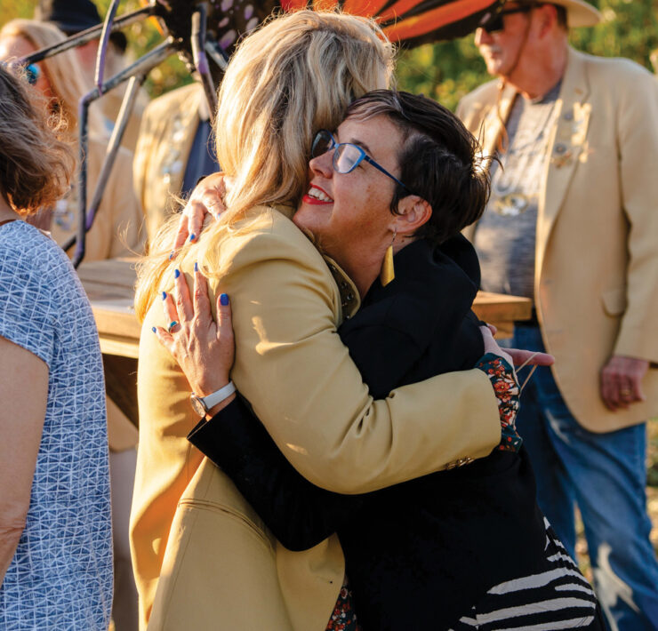 Featured Mayor Barbara Buffaloe Hugging Chamber Ambassador