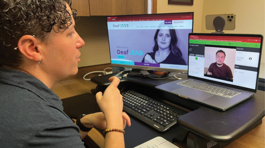 Featured Person Using American Sign Language To Assist A Caller On A Video Crisis Line Call (1)