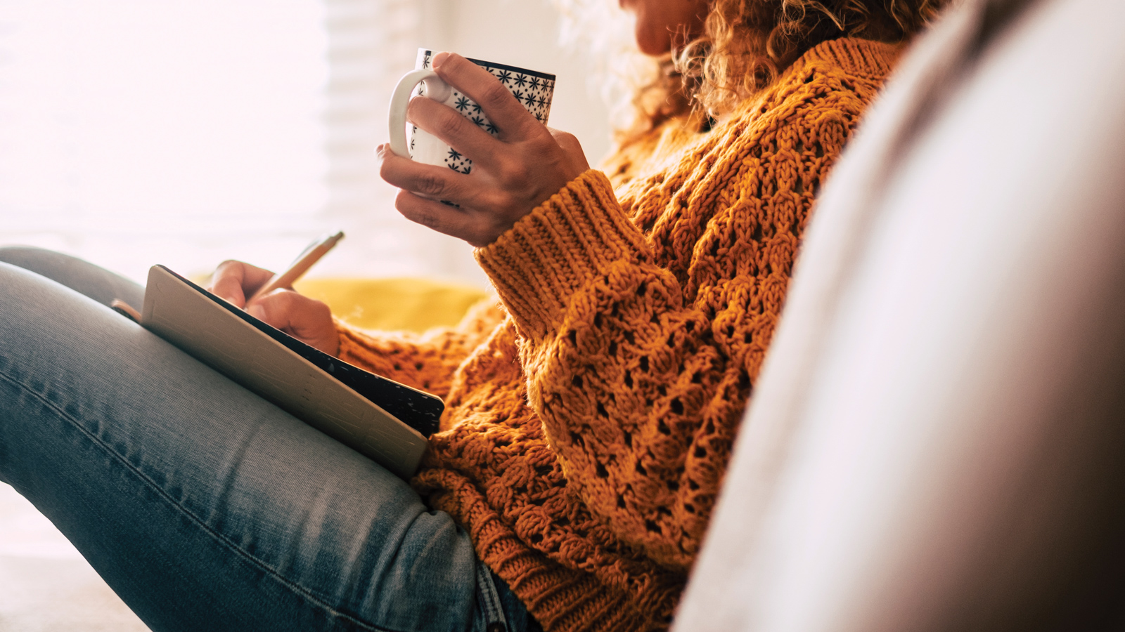 Featured Woman Writing In A Journal While Drinking Coffee