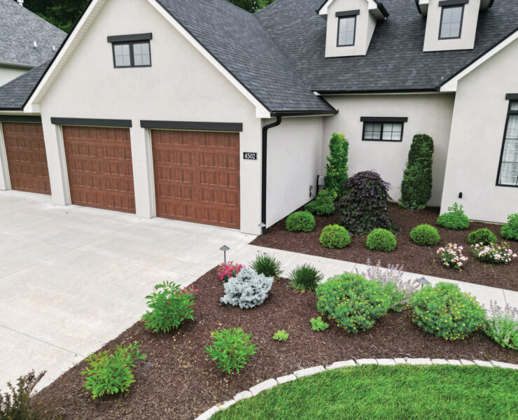 Rost Exterior Of A House With Landscape Edging