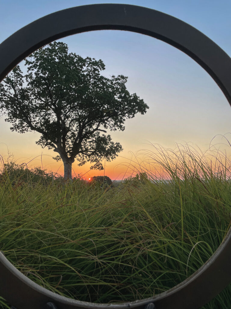 View Of Sunset Through Infinity Statue Artwork At The Boone Health Labyrinth