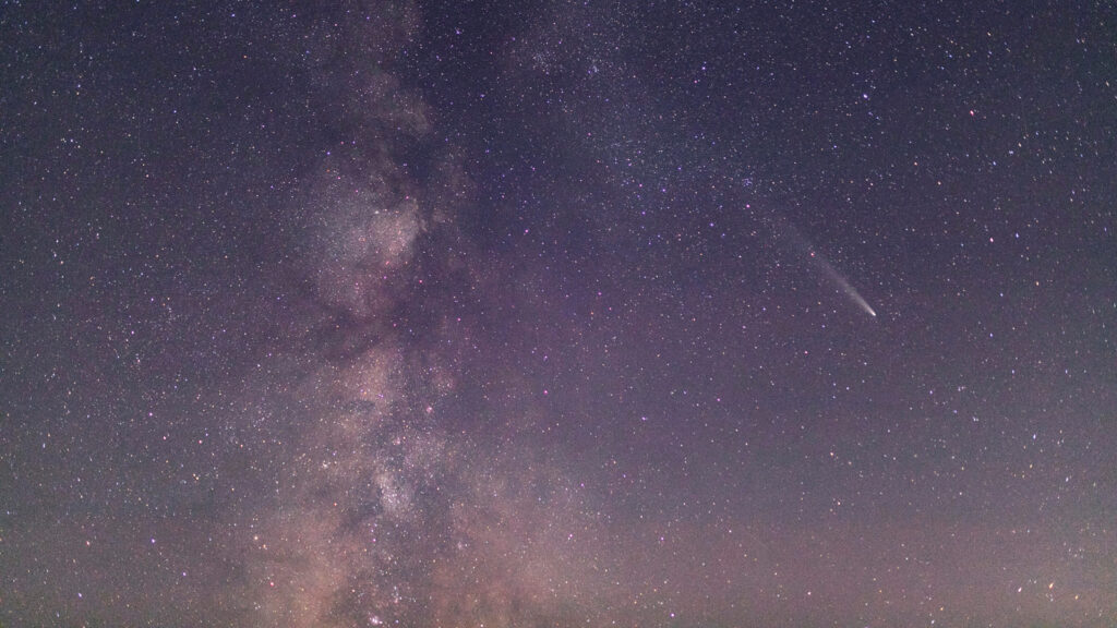 Featured Comet In The Sky Surrounded By Stars