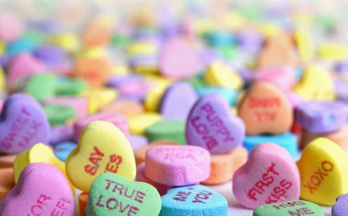 an assortment of valentines style candy hearts