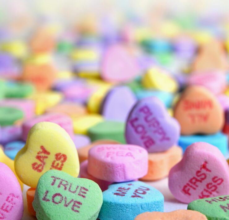 an assortment of valentines style candy hearts