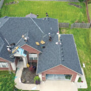 Overhead View Of Roofing Project With People