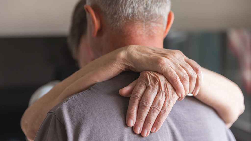 Elderly Couples Hands Holding Each Other While Dancing