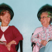 Featured Elderly Woman Gossiping At Hair Salon