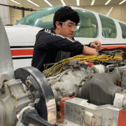 Featured State Tech Student Working On Airplane Mechanics