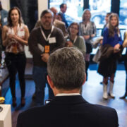 crowd gathered in a art studio for the Featured Unbound Book Festival Event