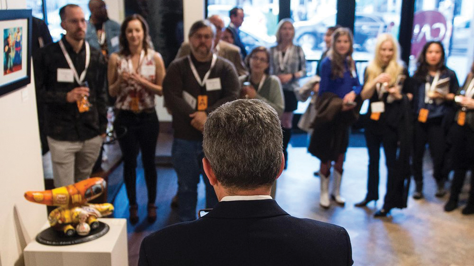 crowd gathered in a art studio for the Featured Unbound Book Festival Event