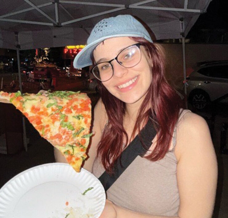 Featured Kelsey Winkeljohn Enjoying Pizza In Austin