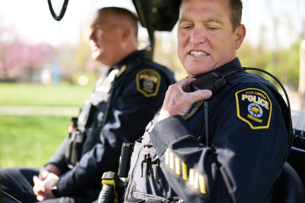Homeless Outreach Officer Brad Anderson Uses Walkie Talkie