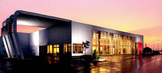For the Joe Machens Nissan dealership showroom and service area, Coil used an aluminum composite panel exterior over a pre-engineered structure and installed environmentally friendly mechanical systems.