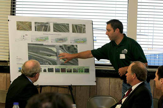 Richard Perkins, an engineer with the Columbia Parks and Recreation Department, explains the city’s plans for new welcome signs along the entrances into town.