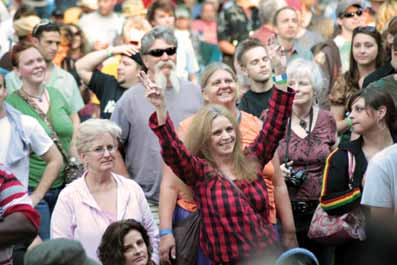 Crowd members enjoy the music in Peace Park.
