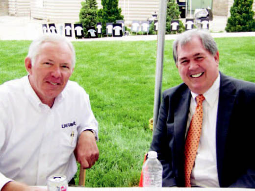 Don McCubbin, United Way board member and executive vice president at Shelter Insurance, and Roger WIlson, MEM president and CEO.