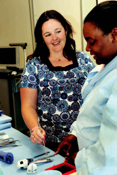Golightly quizzes Spruell on surgical instruments.