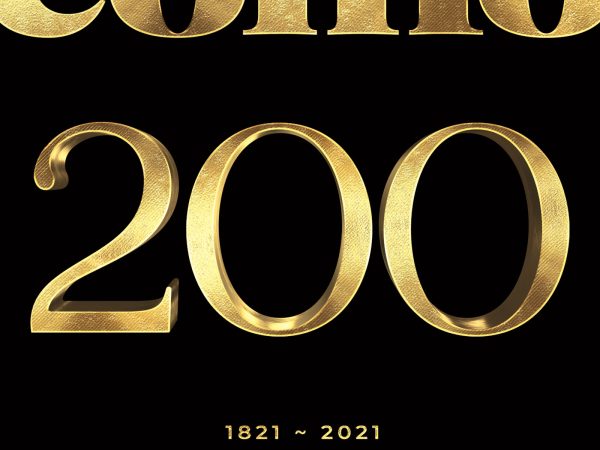 magazine graphic cover with gold text over a black background