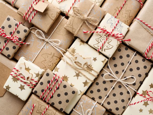 brown paper packages tied up with red and white string