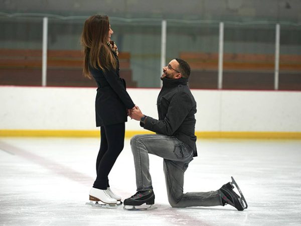 Samuel Atagana and Crystal Richardson get engaged on the ice at Washington Park Ice Arena.