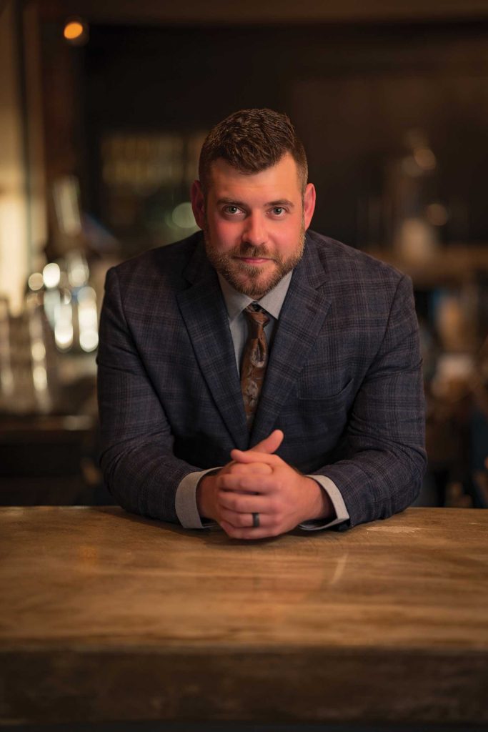 Headshot of a man named Austin Ilsley