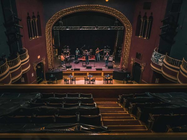 and the stage is framed by a large