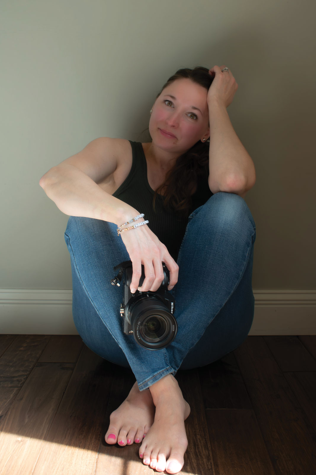 Portrait of Brianna Thoenen with her camera taken by Henley Thoenen, age 8.