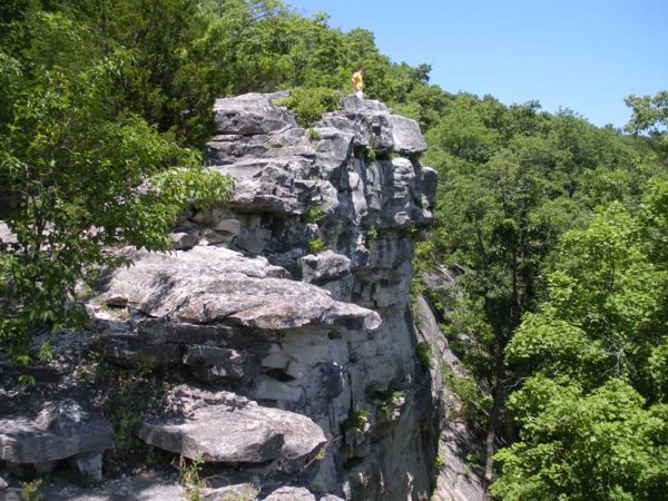 man standing at the edge of Capen Cliff