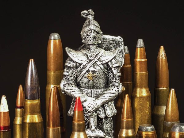 Silver knight statue standing alongside bullets to represent the castle doctrine