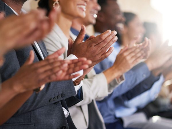 Cropped Shot of an Unrecognizable Diverse Group of Businesspeople Applauding
