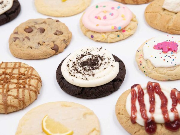 others are frosted with colorful sprinkles