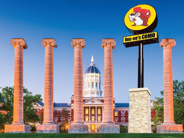 An illustrtion shows a Bucees sign replacing a column on the Mizzou Quad.