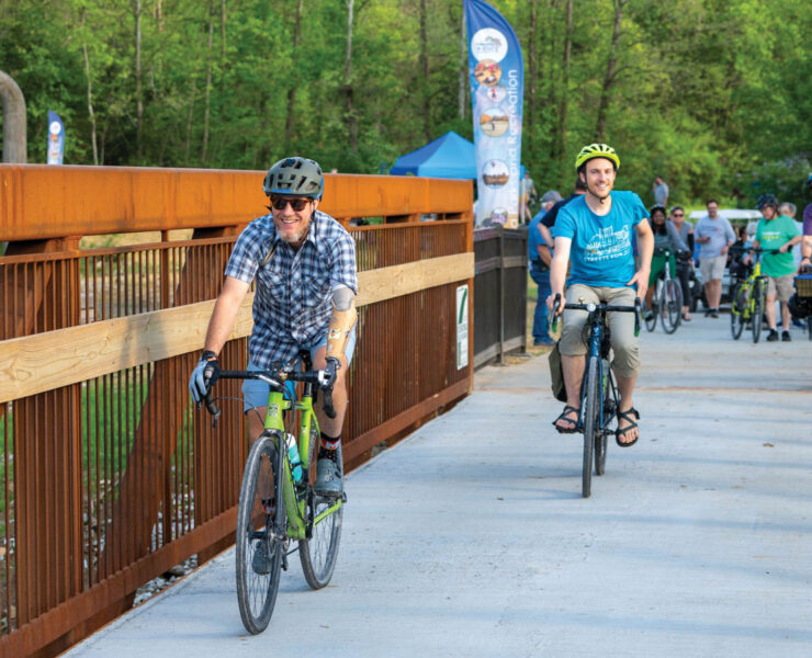 Featured Cyclists Enjoy The New Perche Creek Trail Bridge