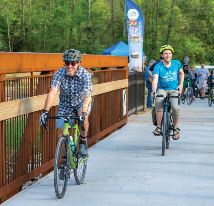 Featured Cyclists Enjoy The New Perche Creek Trail Bridge
