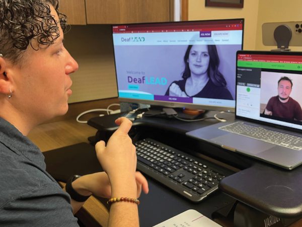 Featured Person Using American Sign Language To Assist A Caller On A Video Crisis Line Call (1)
