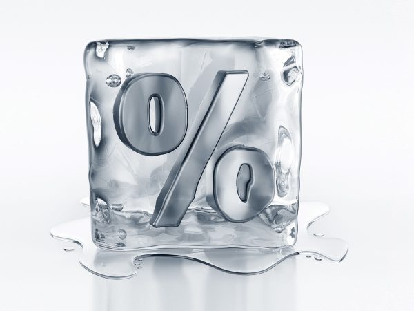 Illustration of ice cube with percentage sign carved into it and ice melting