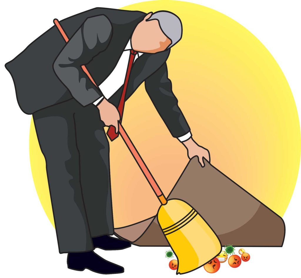 cartoonish virus-like emojis under a brown carpet with a broom. A large yellow circle is in the background.
