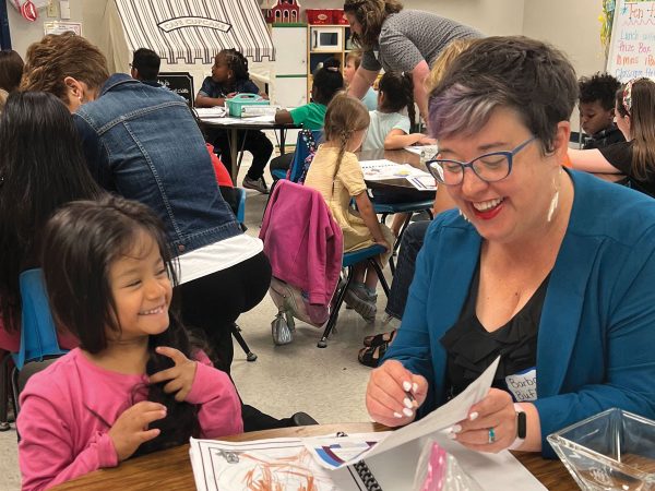 Mayor Buffaloe works with a student as part of Columbia Public Schools’ Partners in Education program.